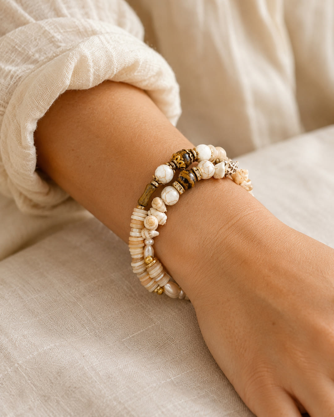 Cream Pearl & Shell Coil Bracelet — worn